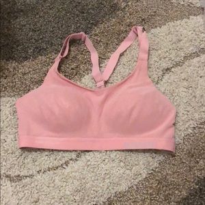 Pink Victoria’s Secret sports bra